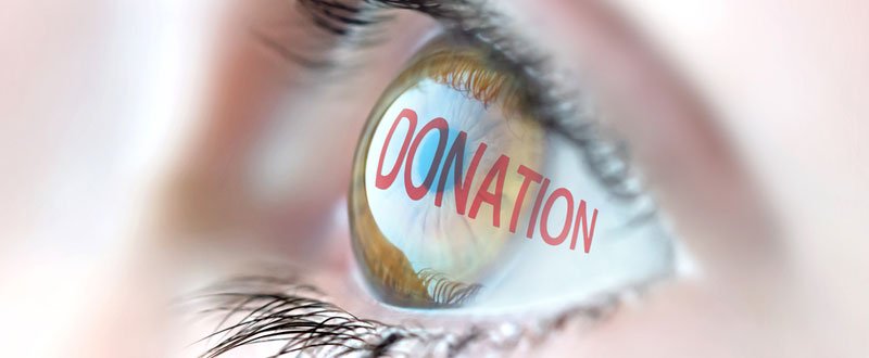 Close up of an eye with donation written on it